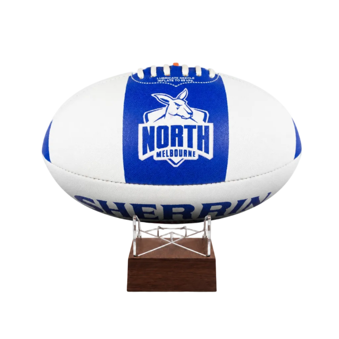 A cremation urn designed and made from an Australian football, with a blue and white North Melbourne Kangaroos theme, mounted on a wooden stand.