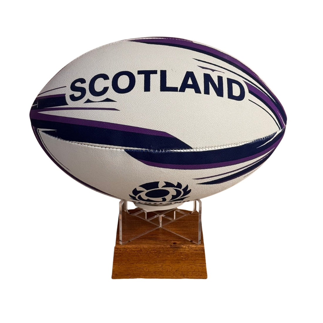 A white Scotland rugby ball with purple and navy blue stripes and the word &